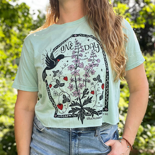 One Day at a Time | July Birth Flower | Blue Crop Top | Large